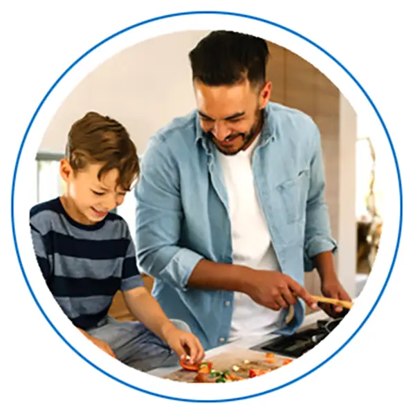father and son cooking